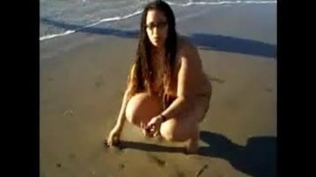 Black Nudist Naked on the Beach