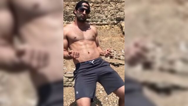 Sexy guy with huge bulge in shorts