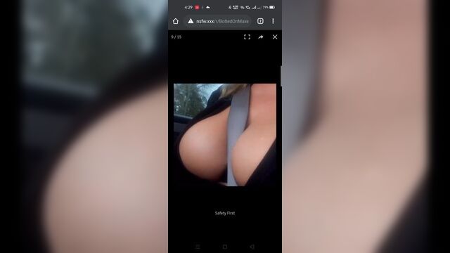 Boobs between Car seat belt