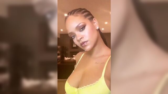 Rihanna selfie showing her big cleavage in a bra