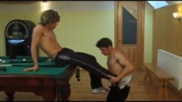 Surfer dude plays with cute guy