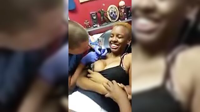 Nipple Pops Out While Getting Tatted