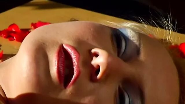 Blonde with blue eye makeup gets fucked hard