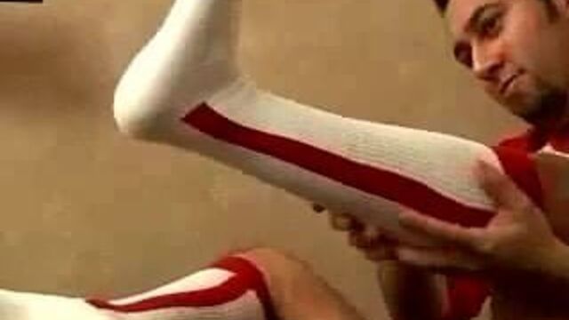 Cute Guy Shows Off Red OTC Stirrup Baseball Socks
