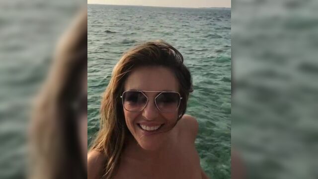 Elizabeth Hurley in a white bikini
