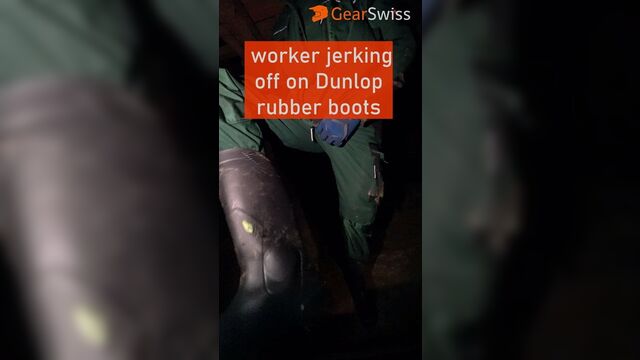 worker jerking of on Dunlop rubber boots