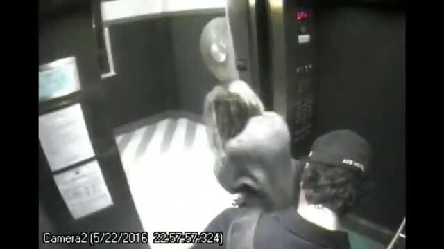 Amber Heard getting on the elevator with James Franco